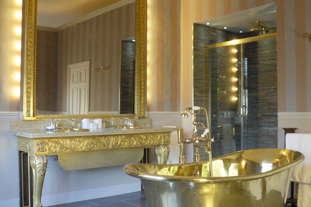 Brass Bateau Bath with Brass Interior