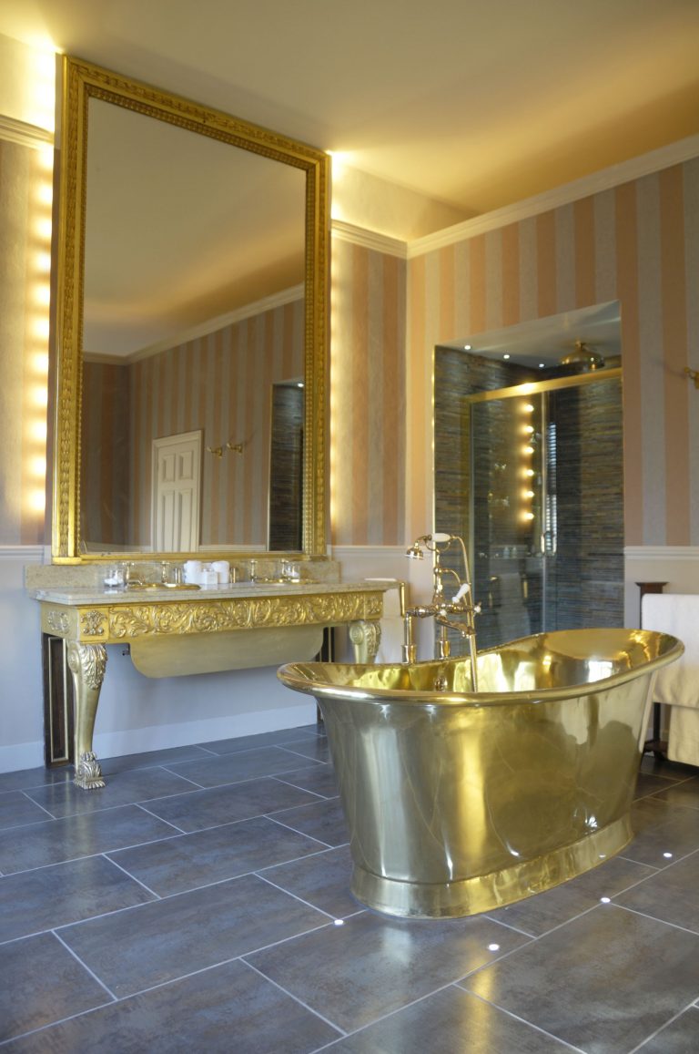 Brass Bateau Bath with Brass Interior