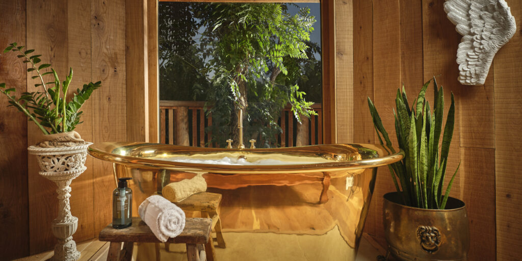 copper bath in a bathroom set up