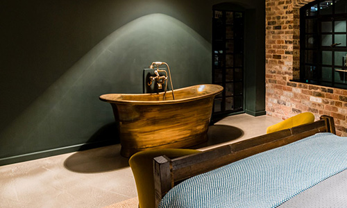 brass bath in a bathroom setup