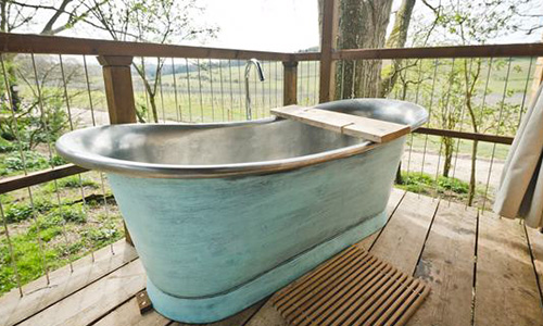 freestanding bath in a bathroom setup