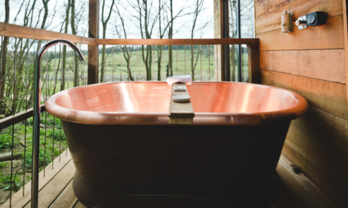 freestanding bath in a bathroom setup