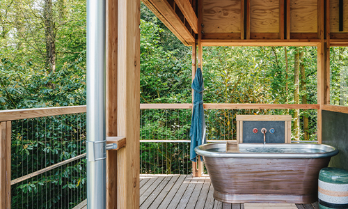 freestanding outdoor bath in an exterior set